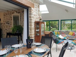 Véranda 35m2 dans un écrin fleuri