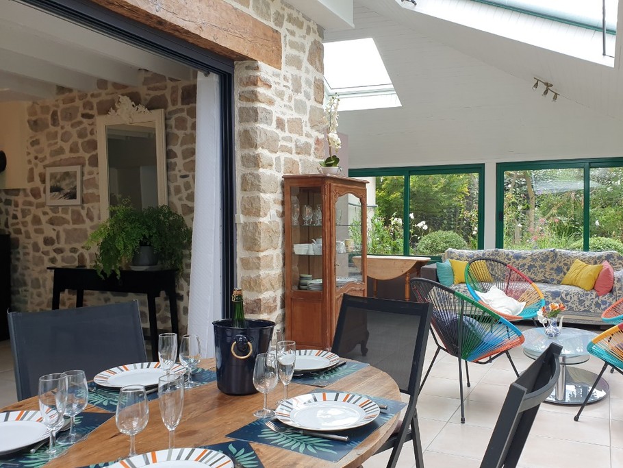 Véranda 35m2 dans un écrin fleuri