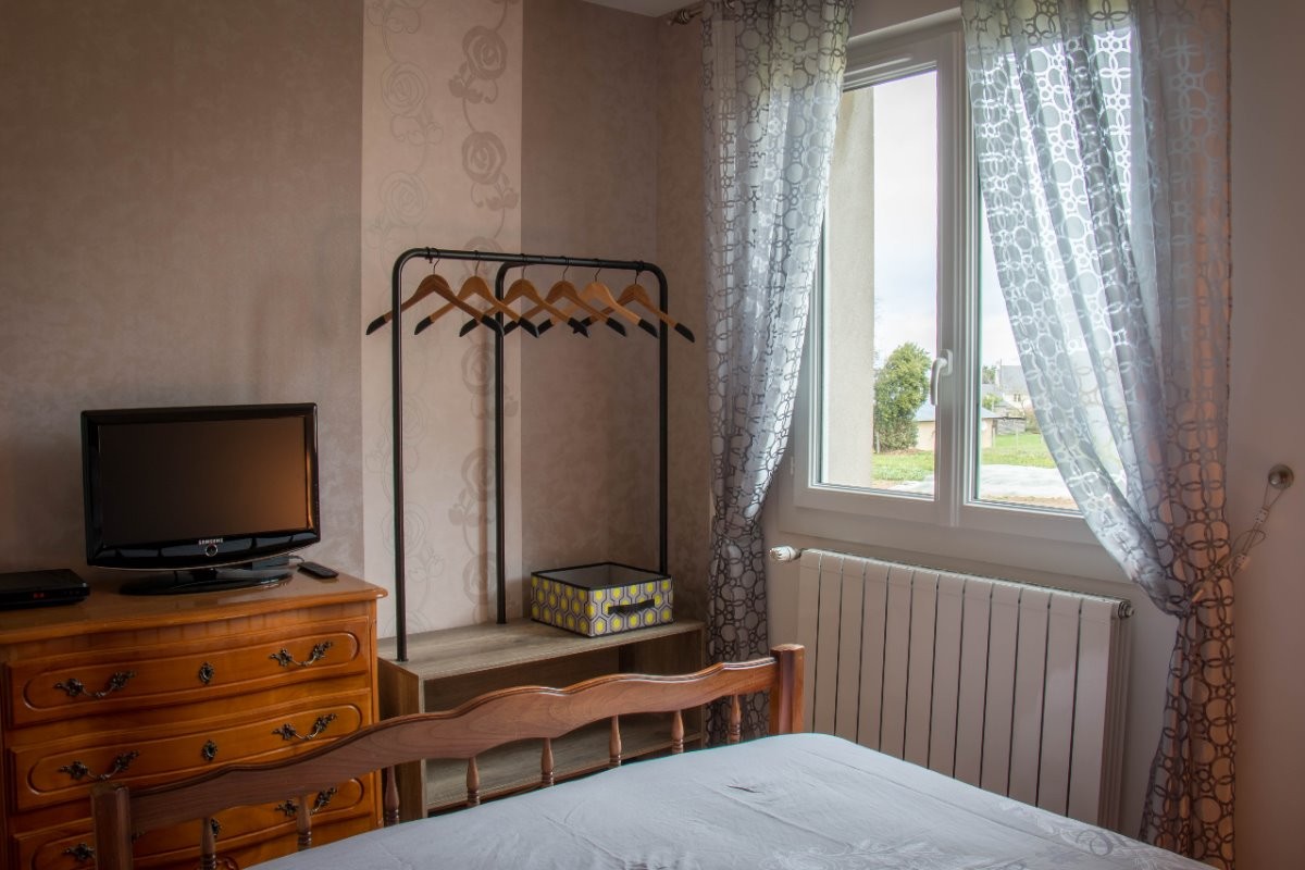 Chambre avec télévision au RDC