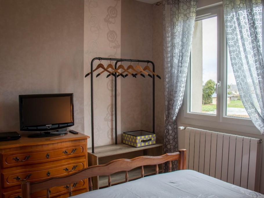 Chambre avec télévision au RDC