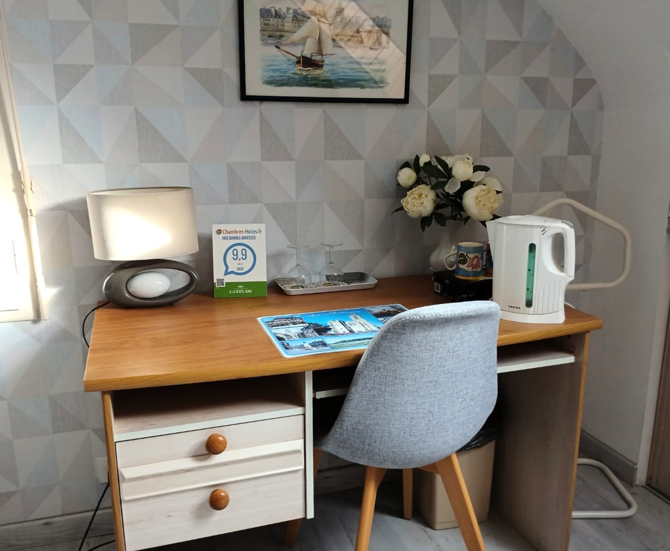 Bedroom 1 - 140 x 190 cm bed with desk, kettle and tea set, TV, wardrobe and chest of drawers.