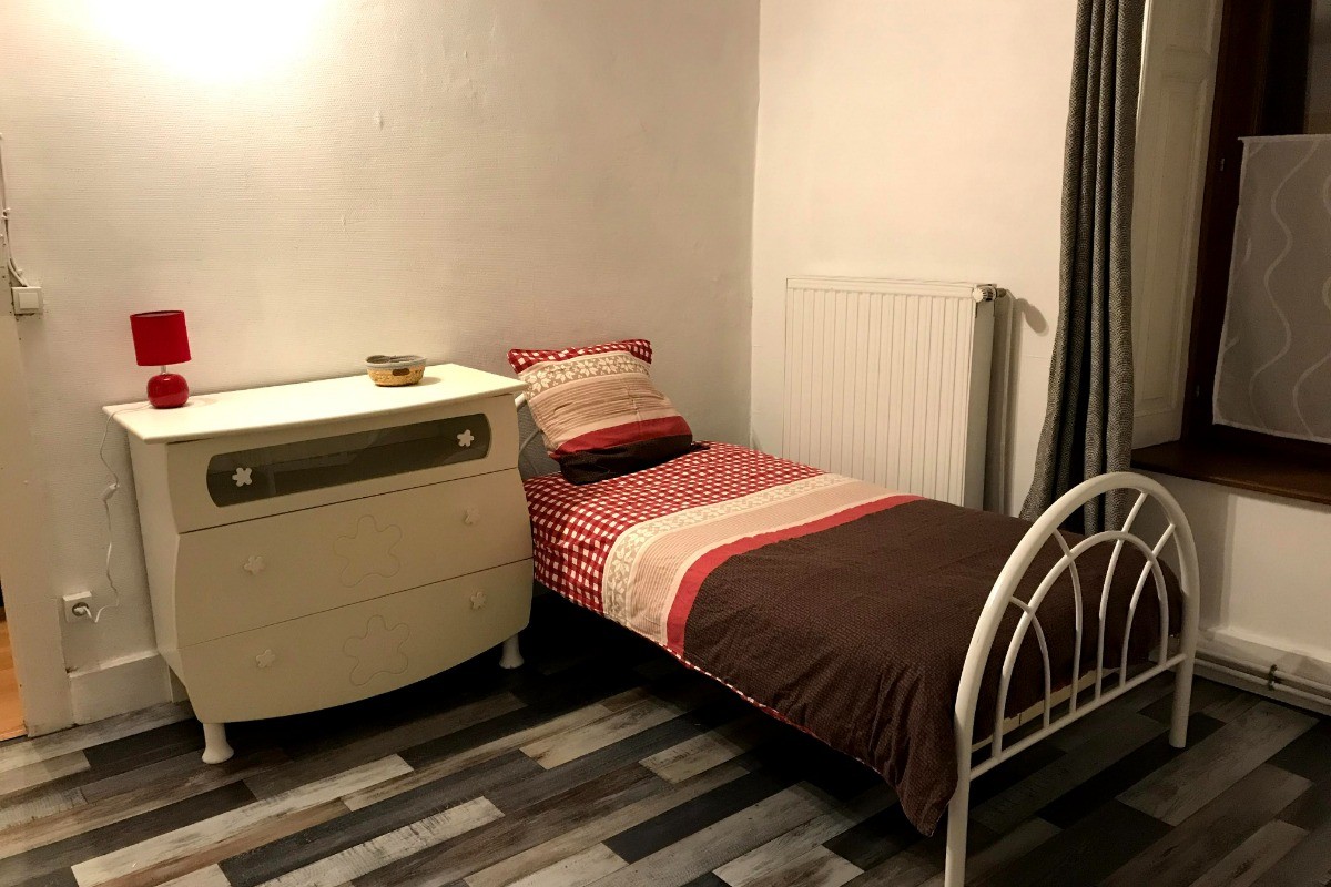 Chambre avec 3 lits individuels