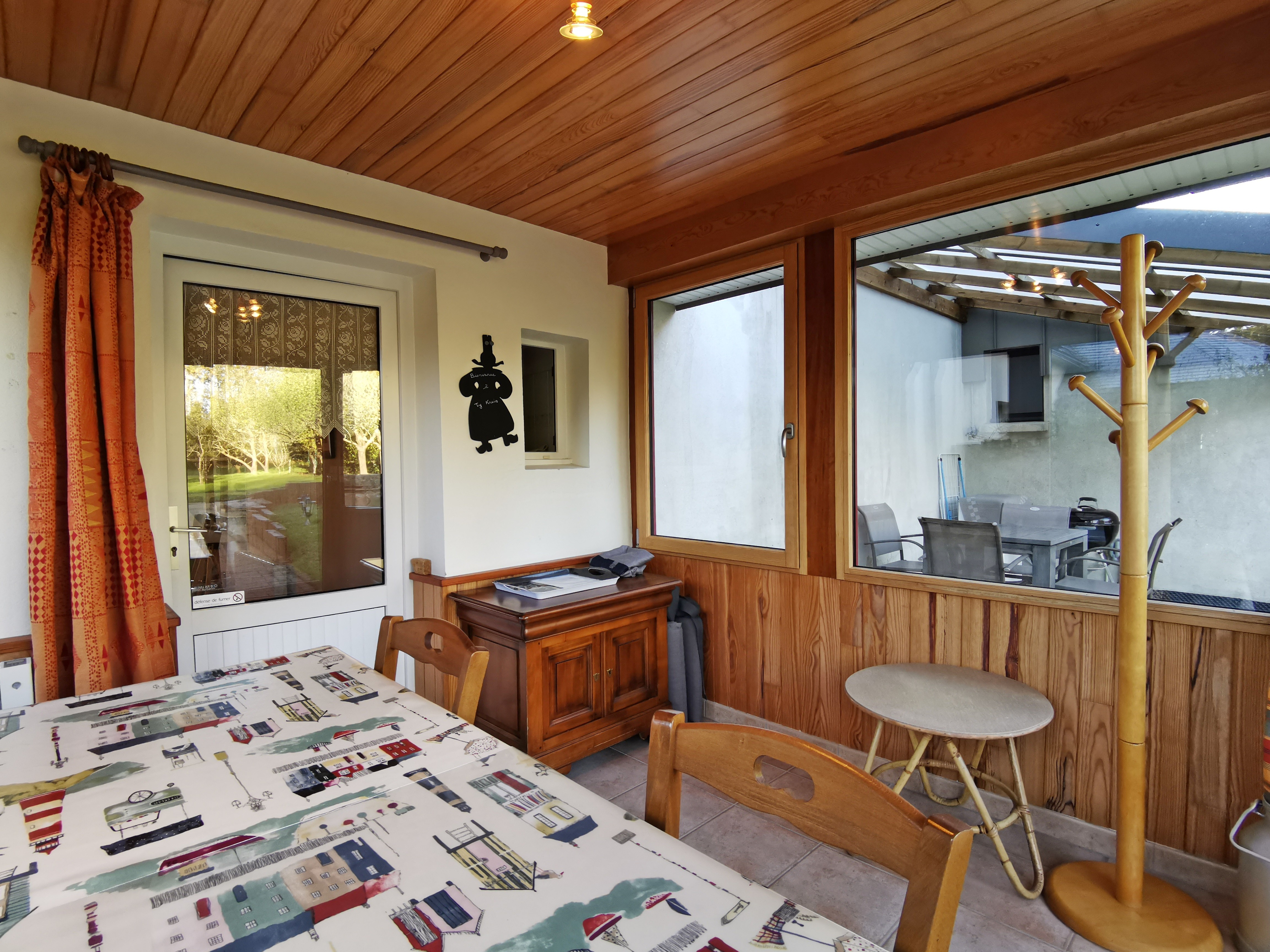 véranda avec accès au séjour salon