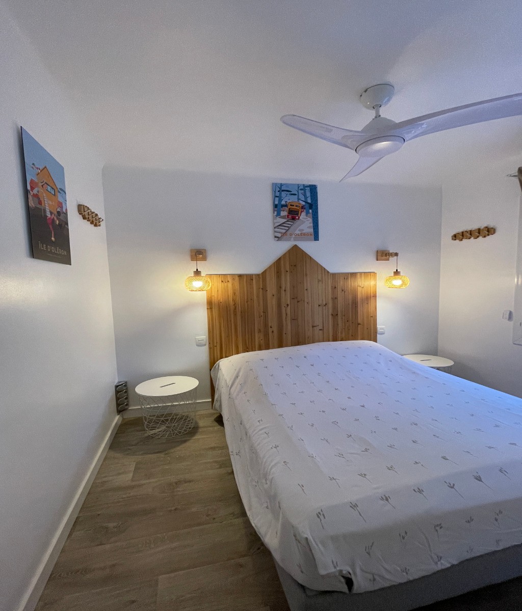 Room with a view of the inner courtyard, equipped with a fan.Bultex bedding and mattress.