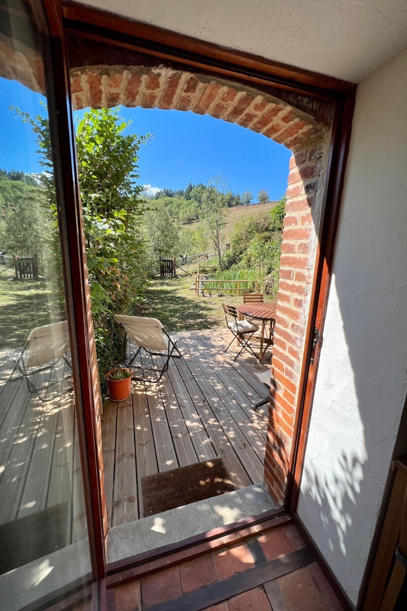 Porte d'entrée, vue sur la terrasse