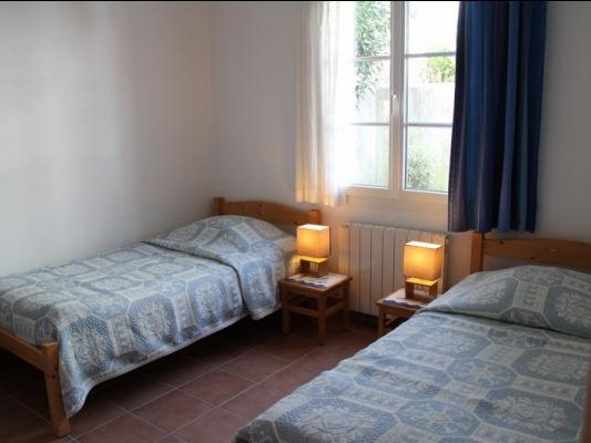 One bedroom with 2 single beds