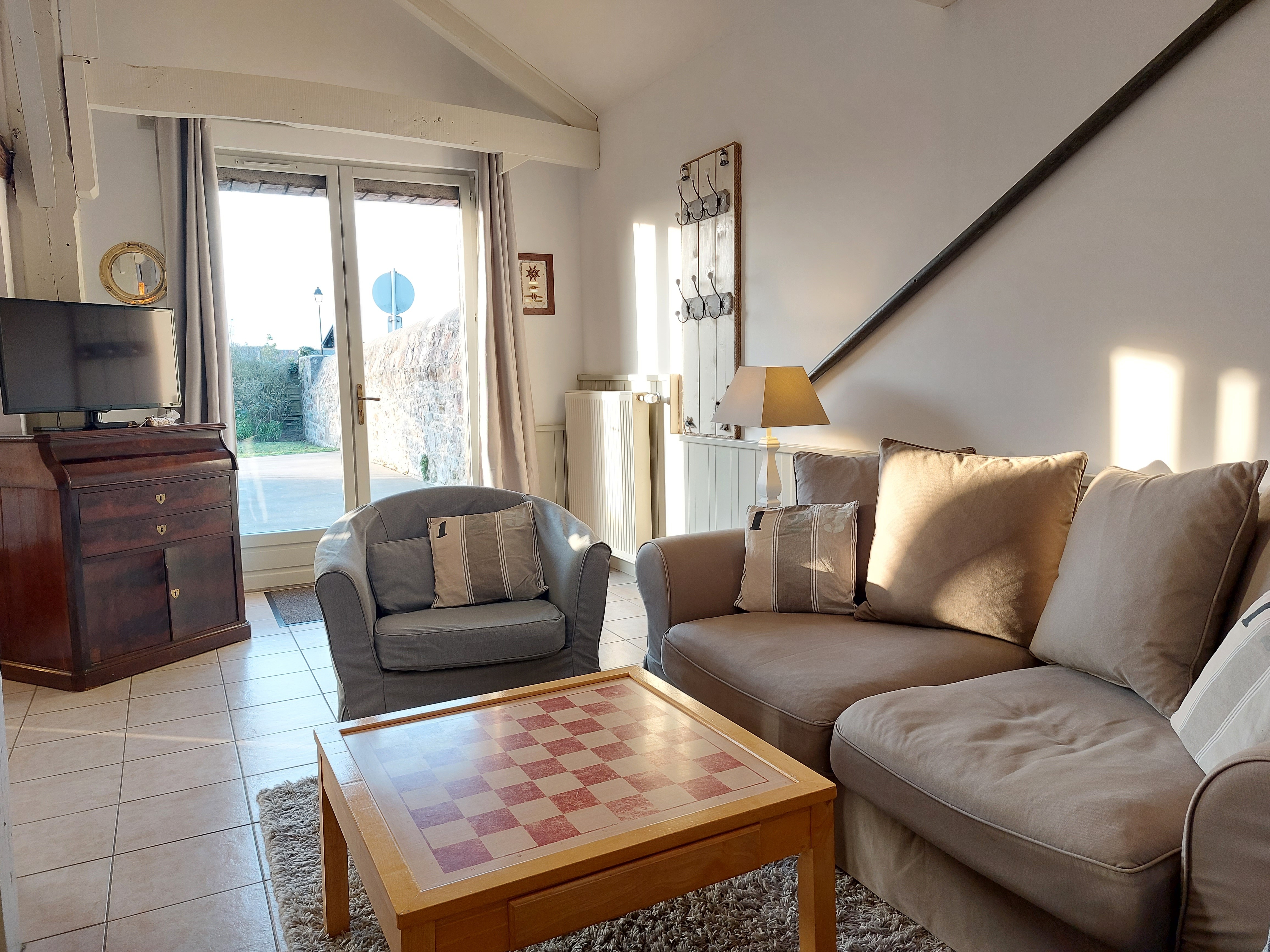 Salon accès directe sur la terrasse gîte Calluna