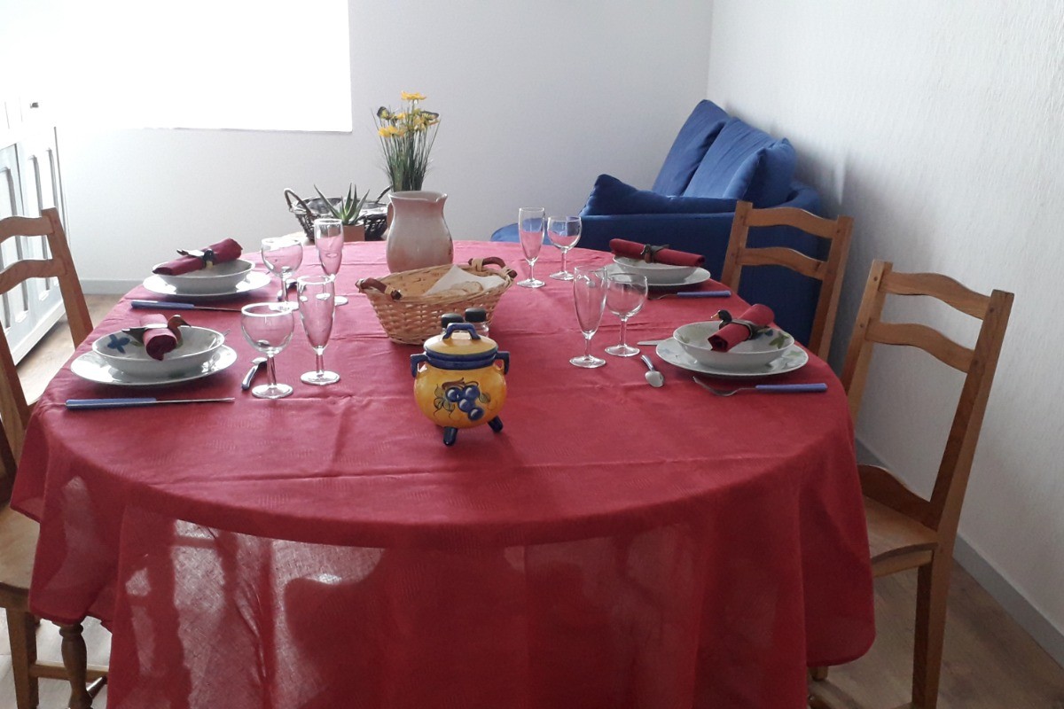 Coin séjour - Appartement Chez Reine - Location de vacances - Étival-Clairefontaine