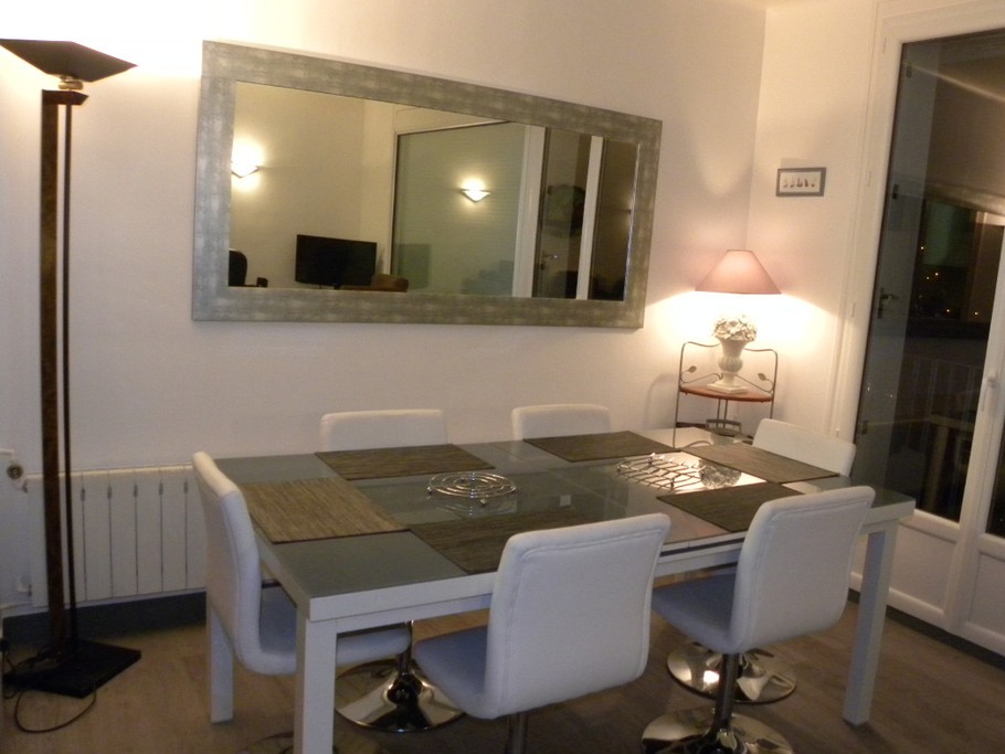 MENES location Perros-Guirec Séjour-salon avec vue panoramique sur la mer