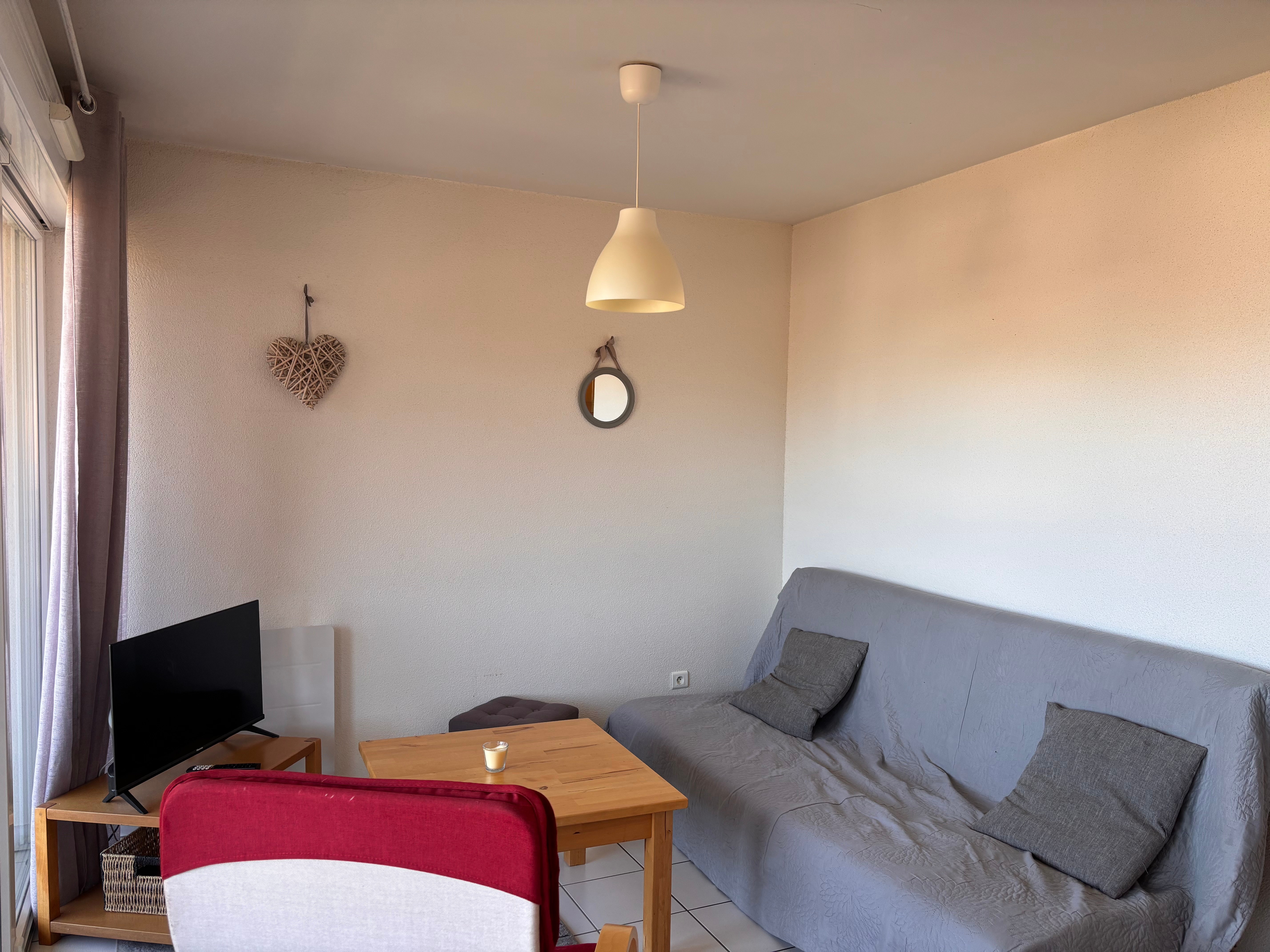 Living room with sofa bed - Apartment with terrace in Gérardmer