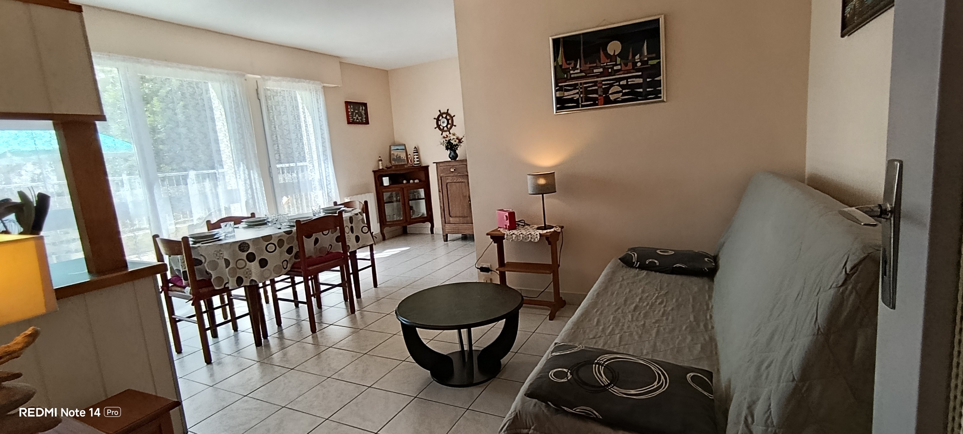 The dining and lounge areas in the living room – “Le Beaulieu” flat