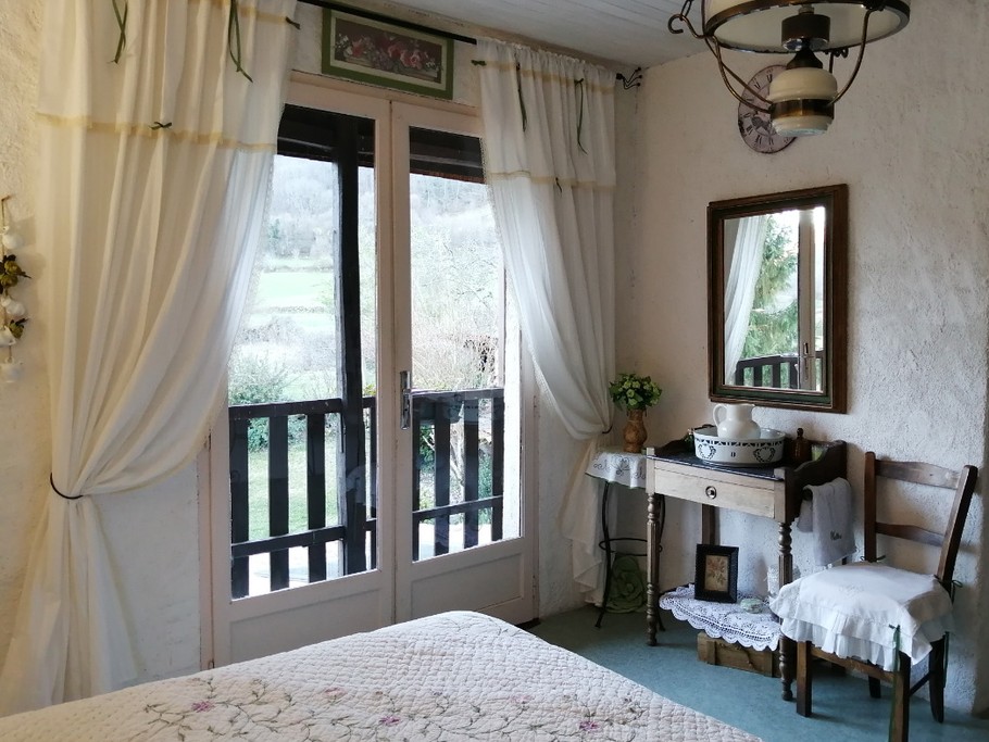 Chambre "Vert Romance" et son balcon privatif, plein sud