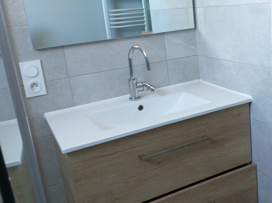 Fully refurbished bathroom with a large shower and vanity unit. Separate toilet.