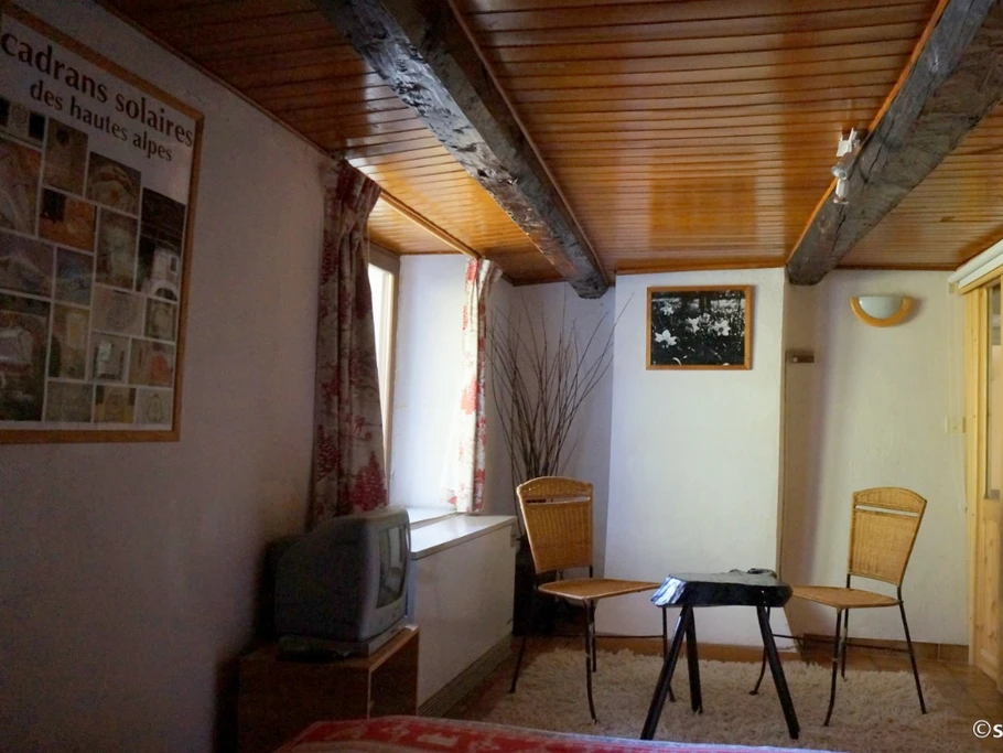 Chambre parentale coin salon