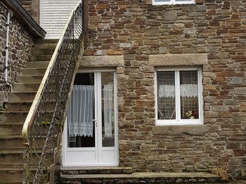 Front of the country house, in stone with character. Private parking in front of the house.