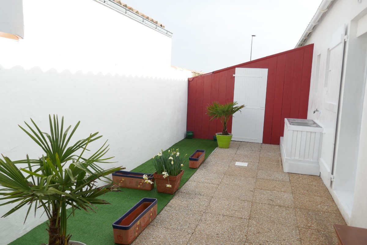patio sur l'arrière de la maison - accès depuis la cuisine