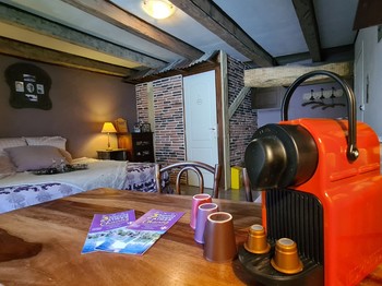 un café avec les capsules du torréfacteur du village à votre disposition en chambre