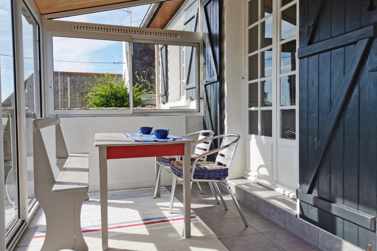 Véranda 1 en façade de la maison avec accès séjour et cuisine
