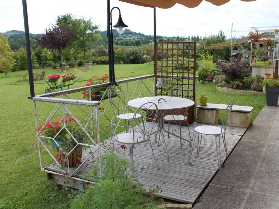 La terrasse avec store
