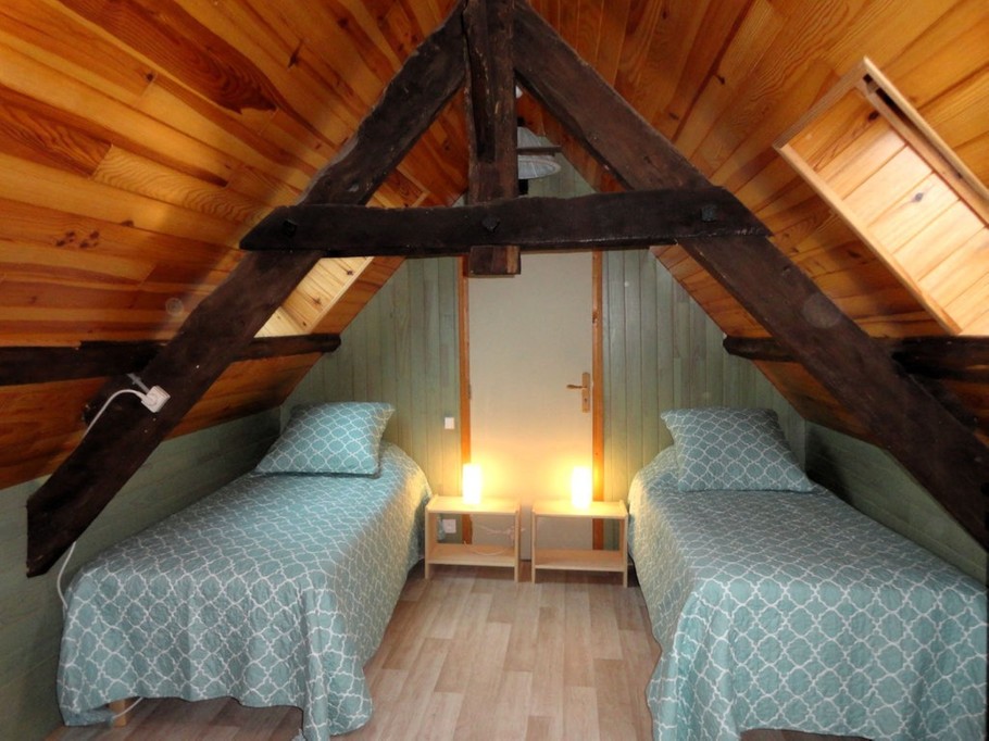 Chambre à l'étage climatisée