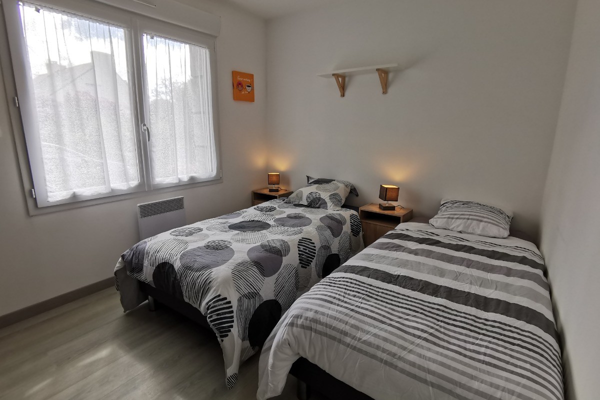 Chambre avec 2 lits 90