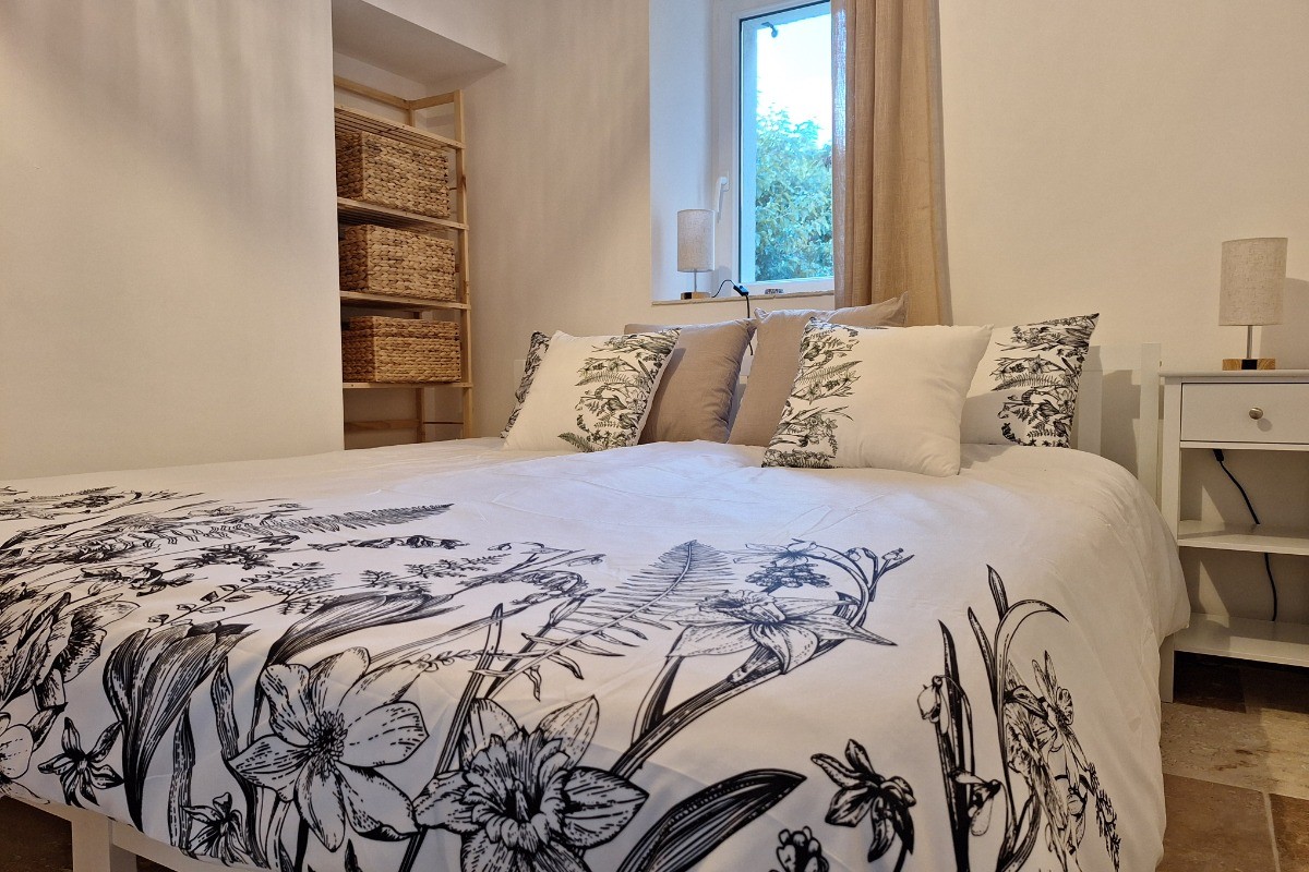 Chambre avec lit double de 180cm de largeur