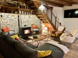 salon au coin du feu
Salon cocooning avec TV connectée