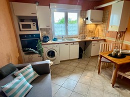 Pièce principale avec cuisine équipée