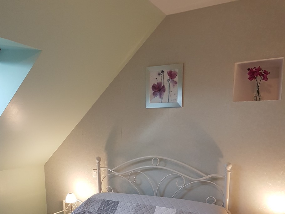 Room for 2 people with desk and cot