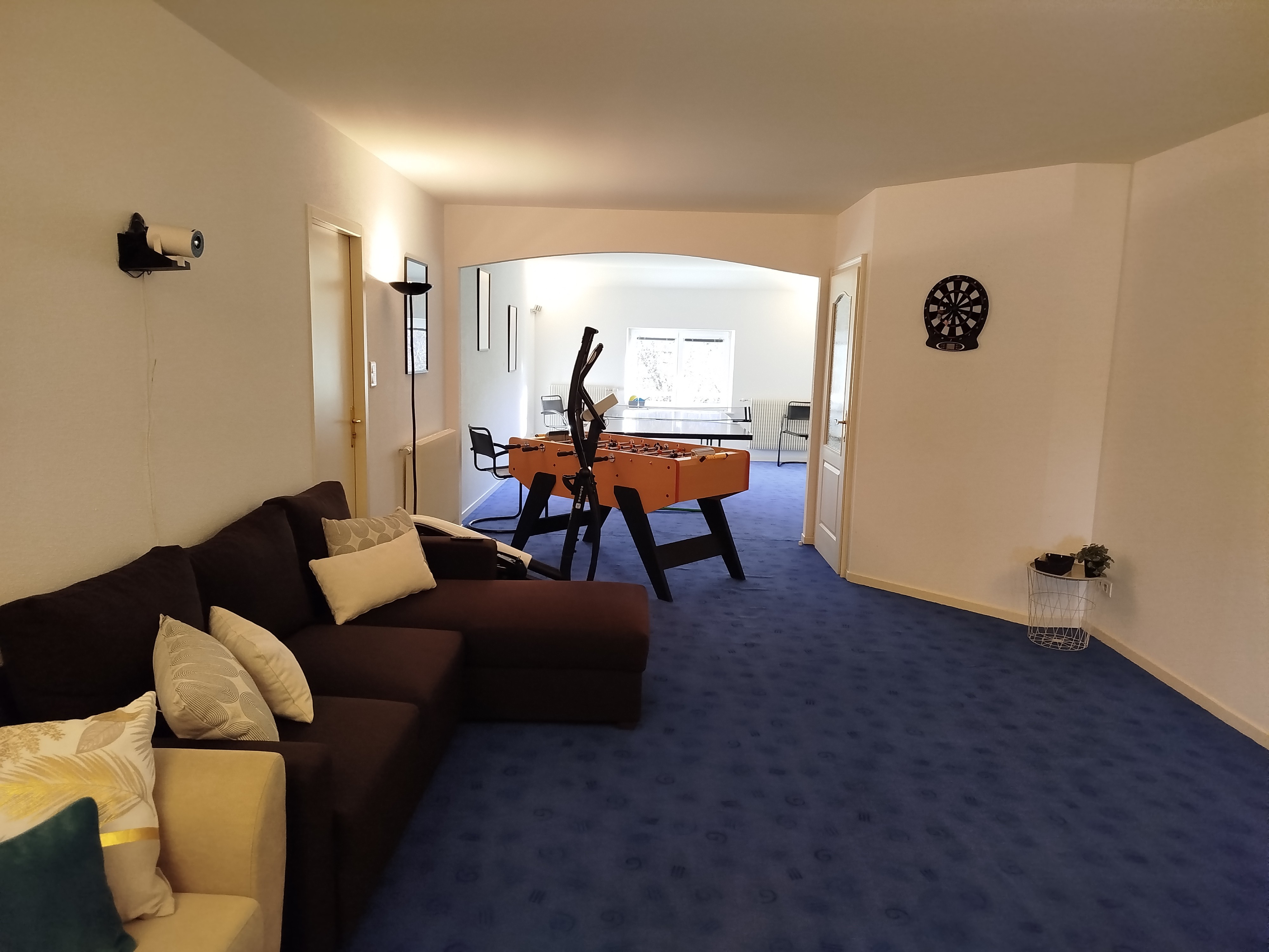 Games/sports room with connected video projector