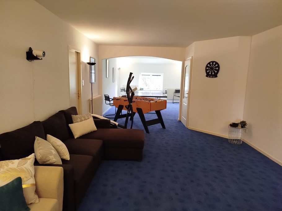 Games/sports room with connected video projector