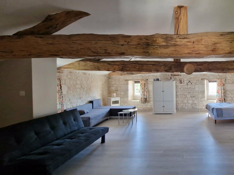 The attic is equipped for 1 or 2 people and a young child with a nappy changing table and cot.