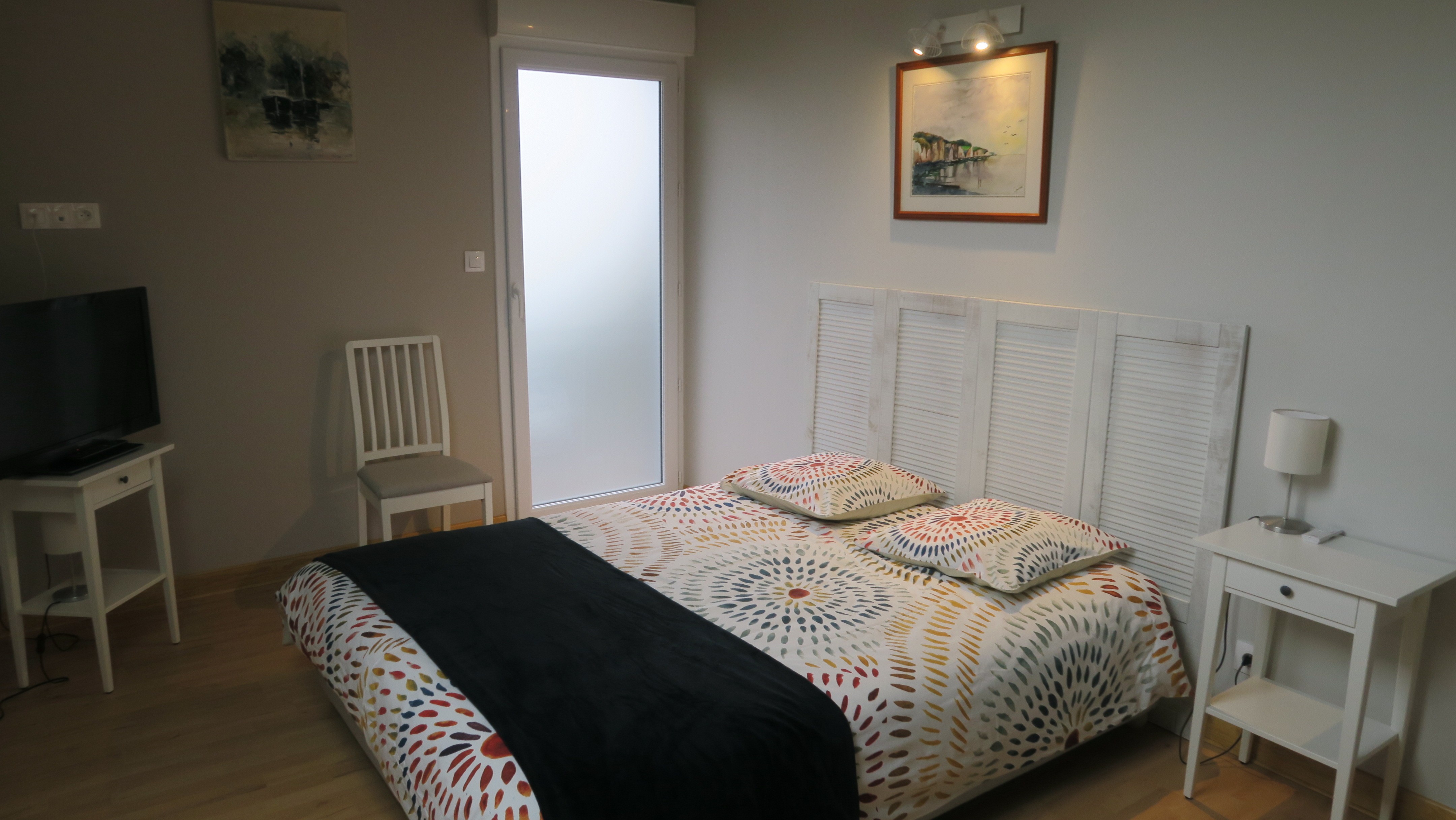 chambre principale avec accès au balcon