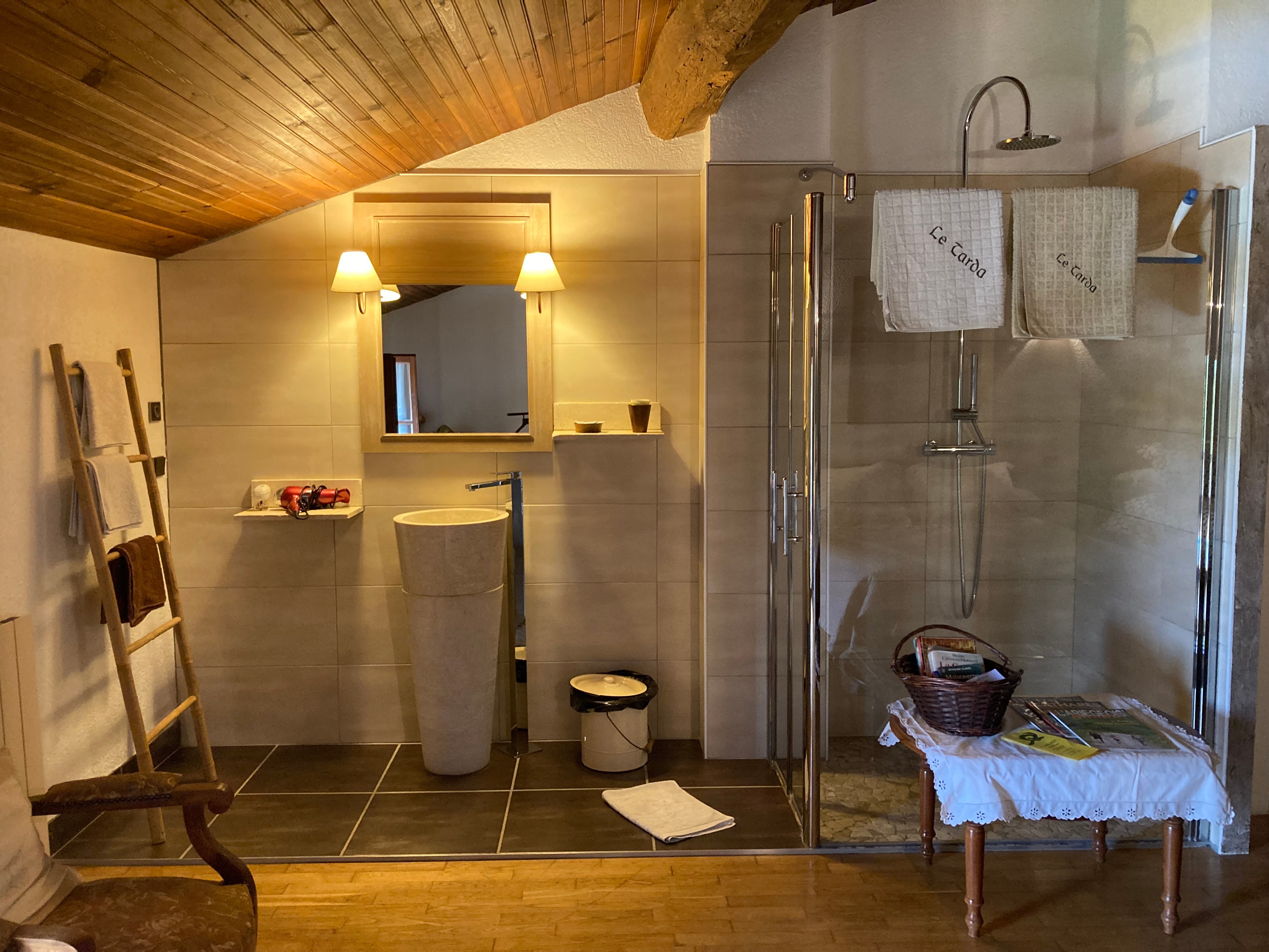 Bathroom opening onto the bedroom