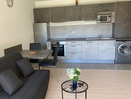 The large, well-equipped living room.