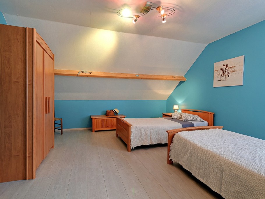 La chambre bleue à l'étage