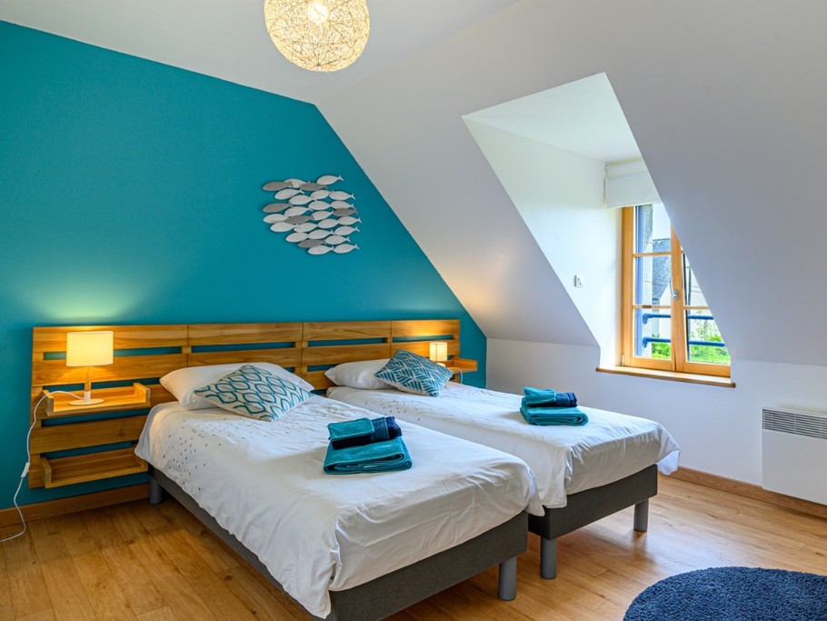 Chambre de l'étage avec lits modulables
2 lits de 80x200 que l'on peut associer