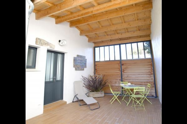 entrée maison et espace détente