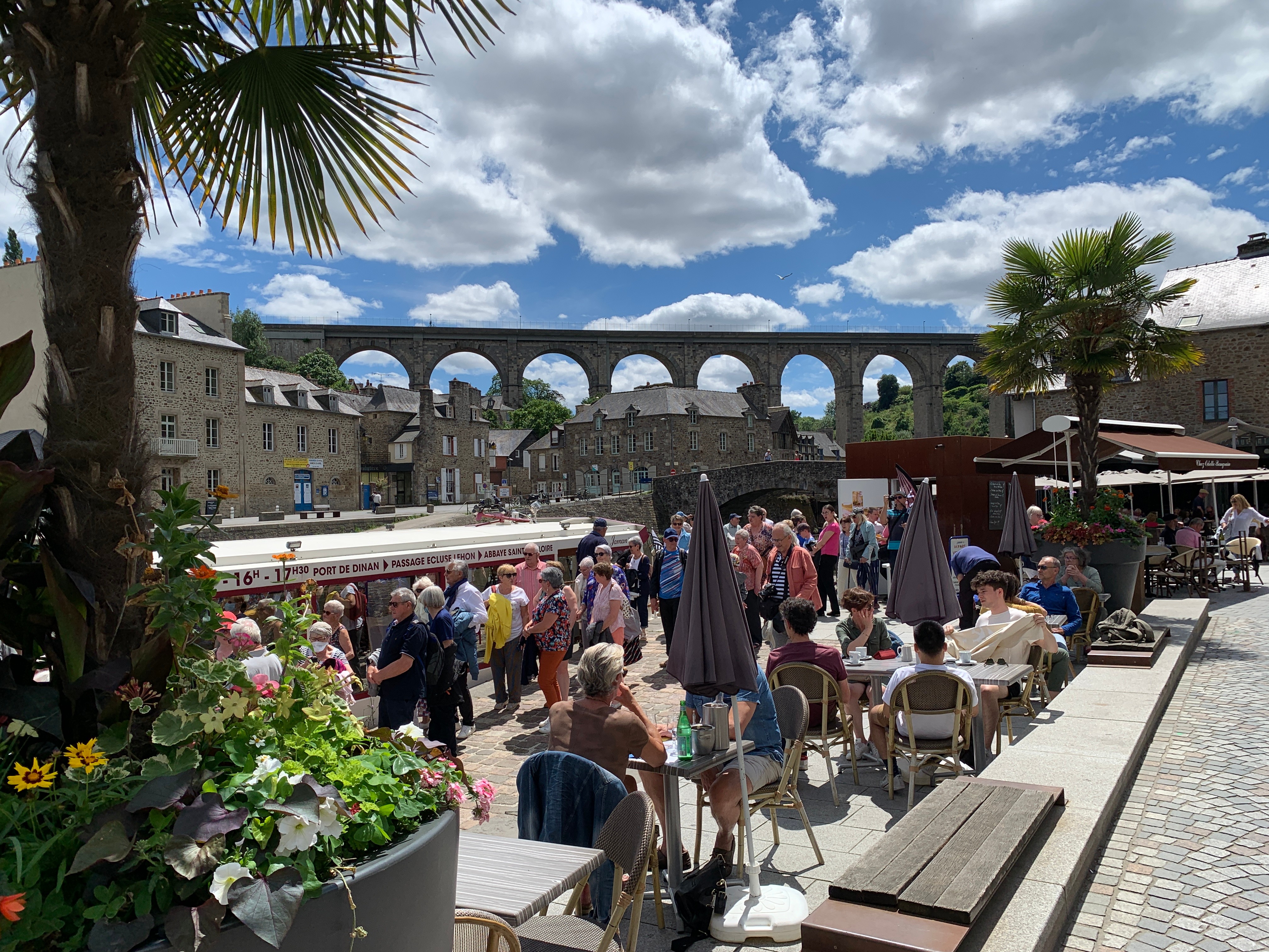 Lively cafés and restaurants at Dinan Port, only moments from the cottage
