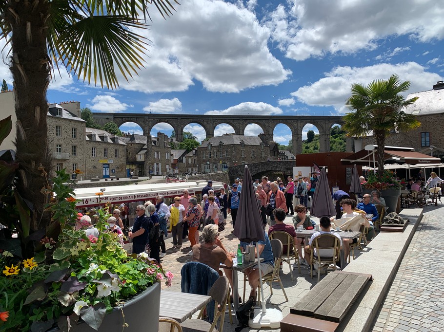 Lively cafés and restaurants at Dinan Port, only moments from the cottage