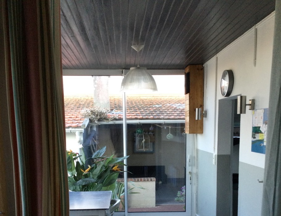 Petite véranda donnant accès à la terrasse d été extérieur