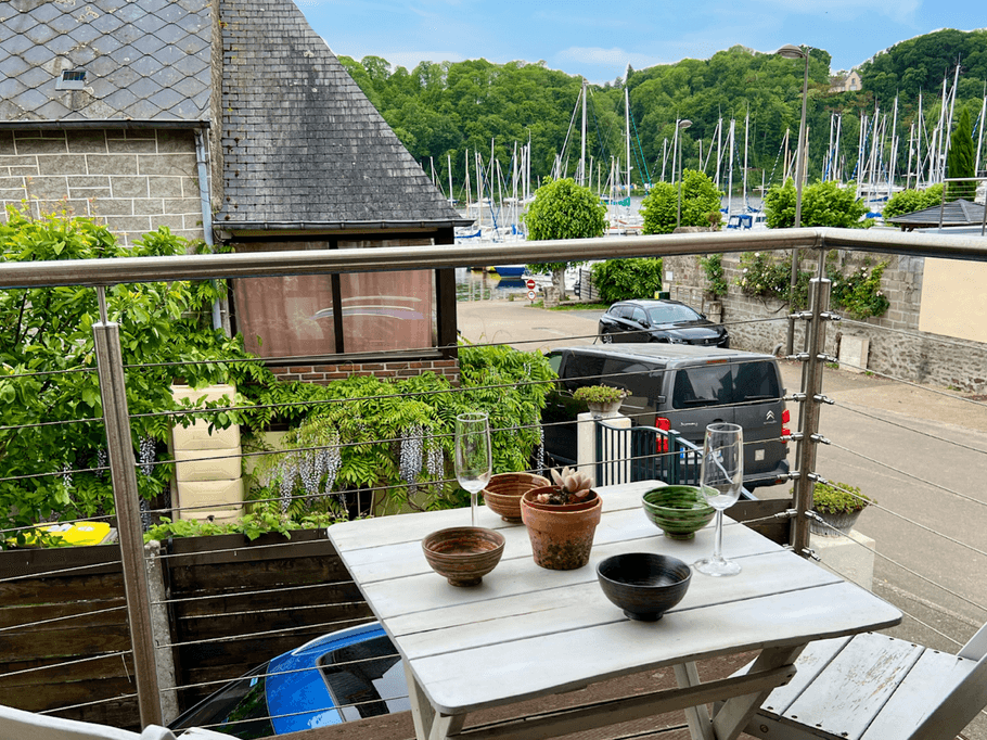 Front balcony with seating and river views