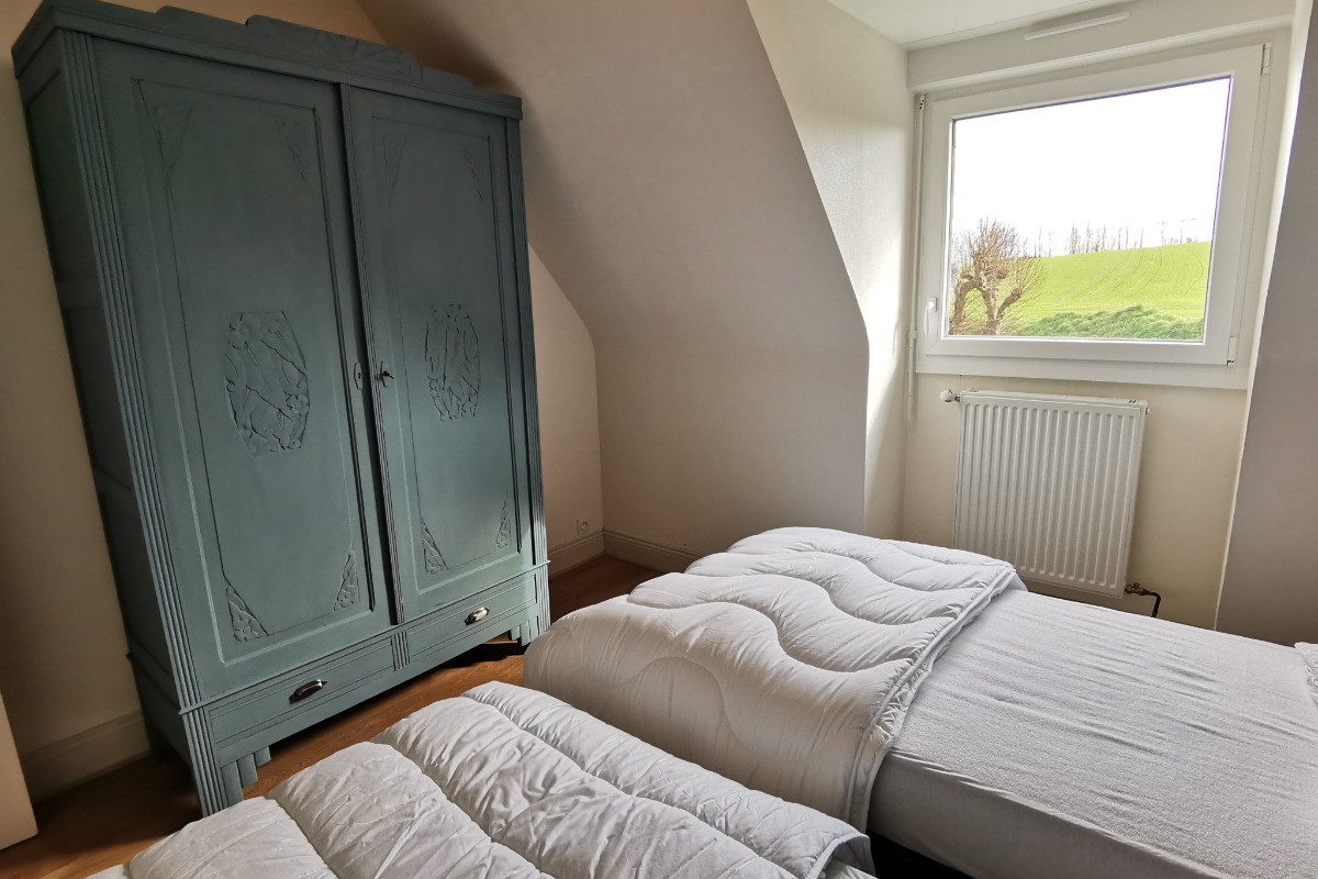 Chambre avec 2 lits 90 à l'étage