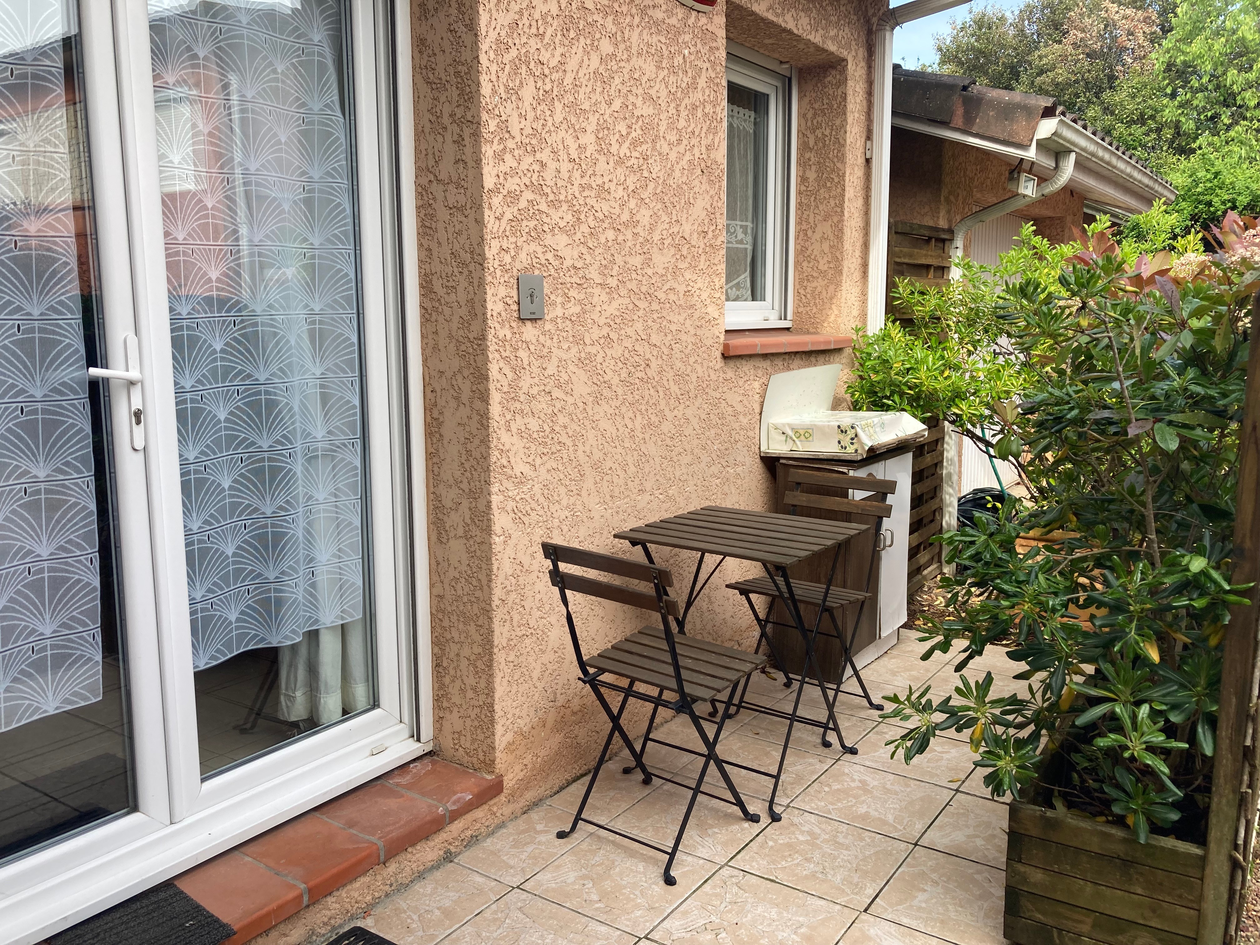 Terrace with barbecue and garden table
