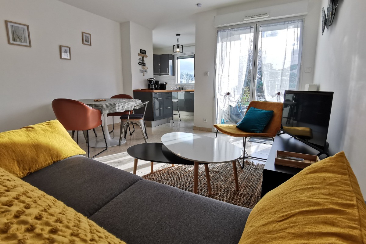 Appartement avec pièce de vie lumineuse et spacieuse