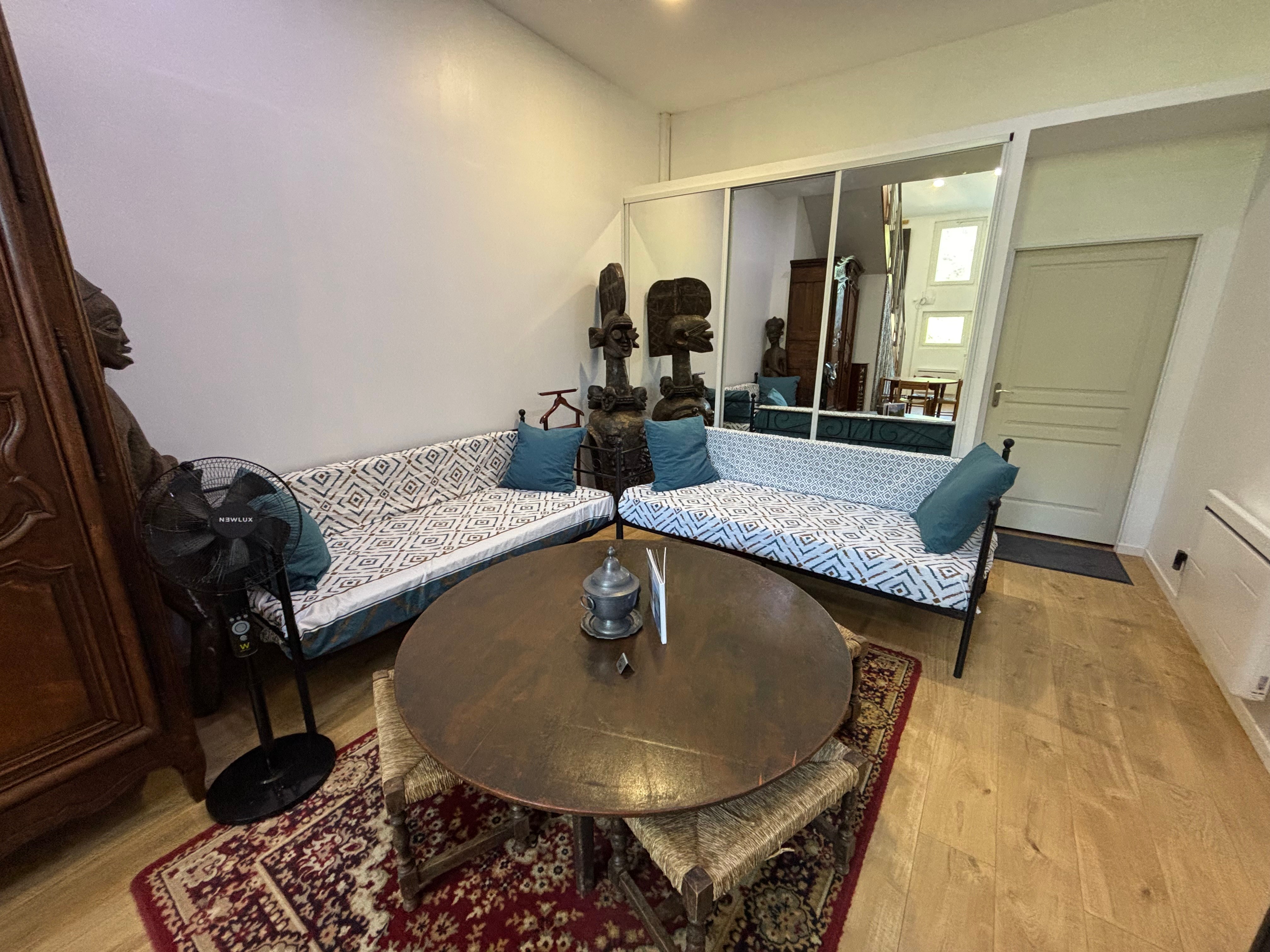 living room with two beds