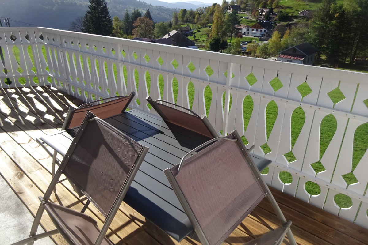 accès au balcon depuis le séjour - Chalet le Podent à La Bresse