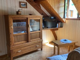 Espace salon avec un peu de lecture pour se détendre