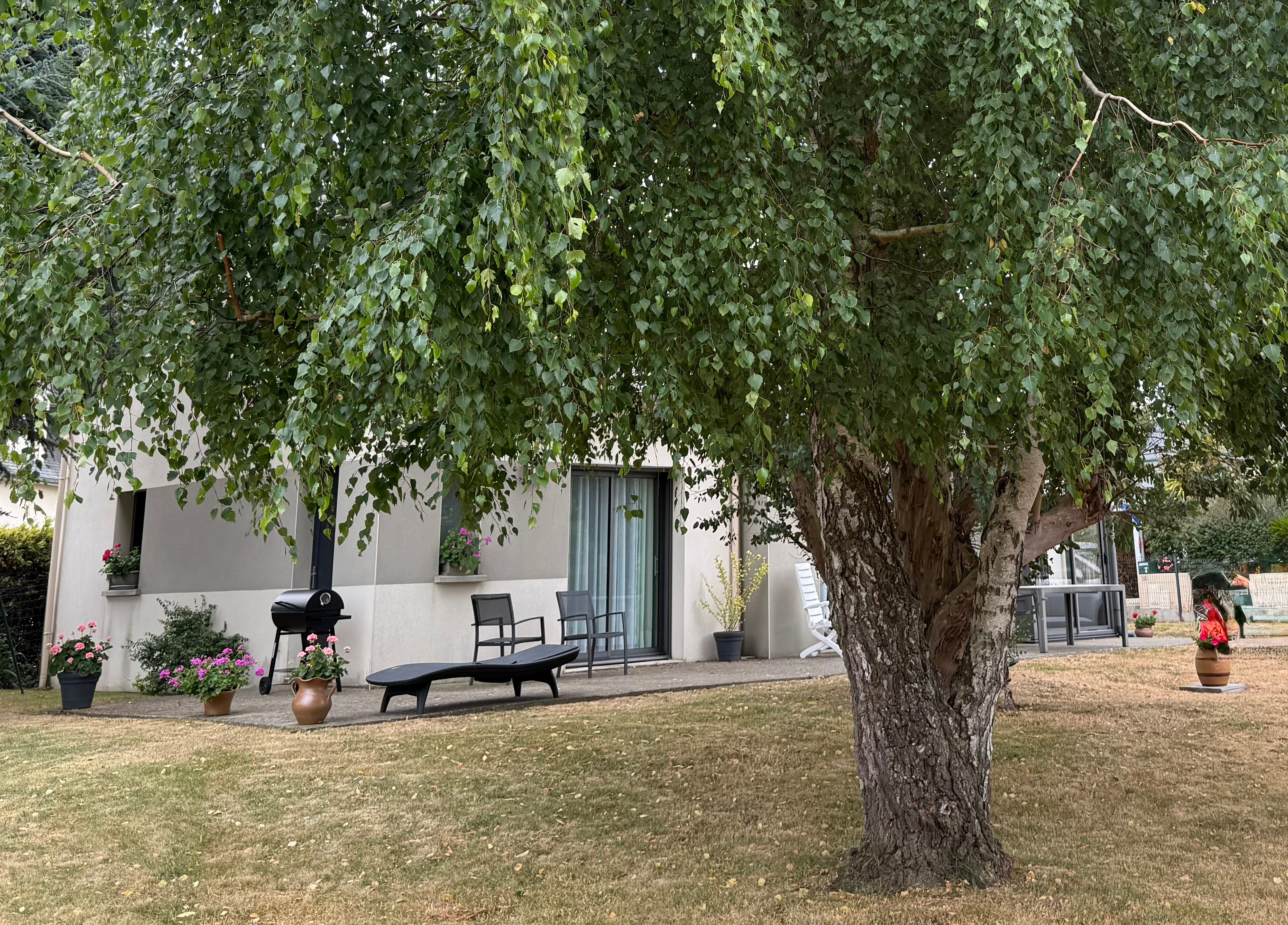 A large, enclosed, shaded garden full of flowers, with a swing, a slide and other children’s play equipment. The property comprises the owner’s house and the holiday cottage, with no neighbours directly opposite. Separate entrance via an electric gate.