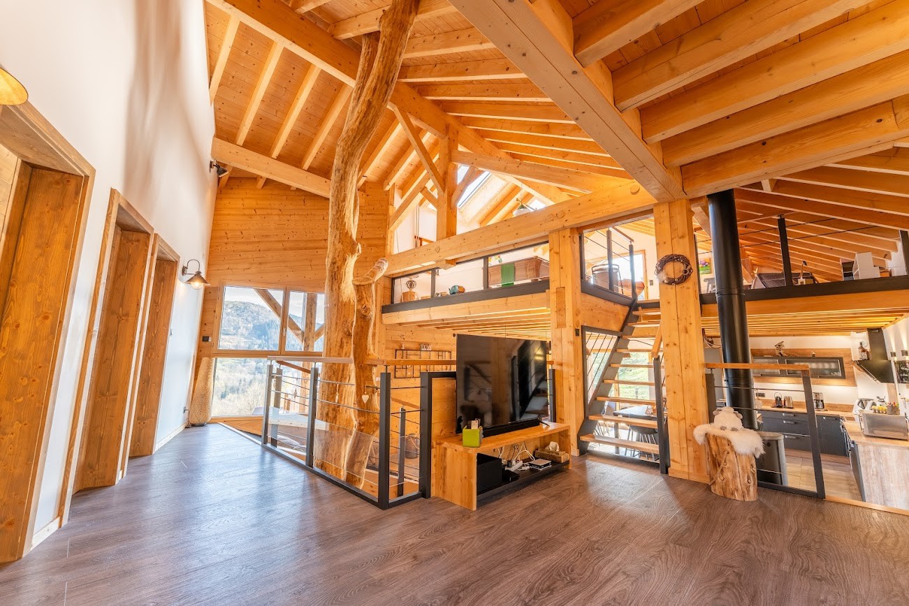 Living room with access to the games room - Chalet "Le Pourquoi Pas" - La Bresse